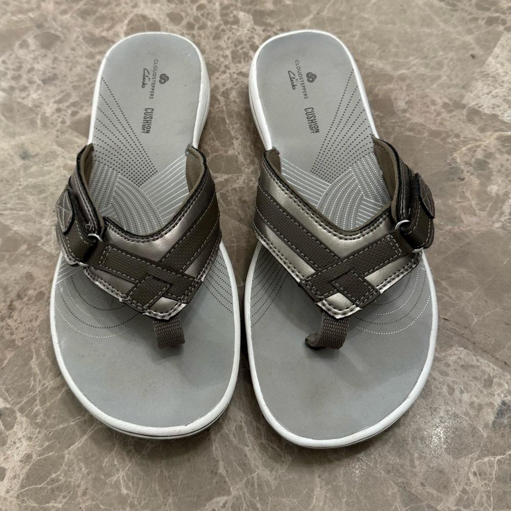 Clark’s flip flops